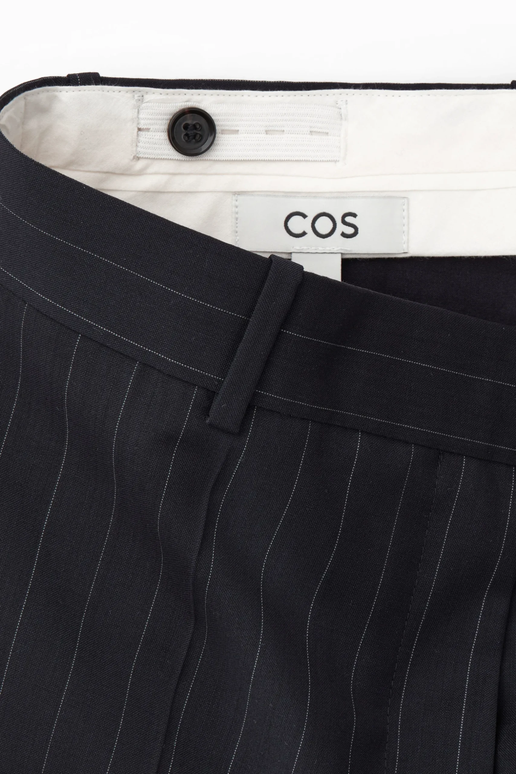 Outlet COS ROZSZERZANE WEŁNIANE SPODNIE – REGULAR FIT