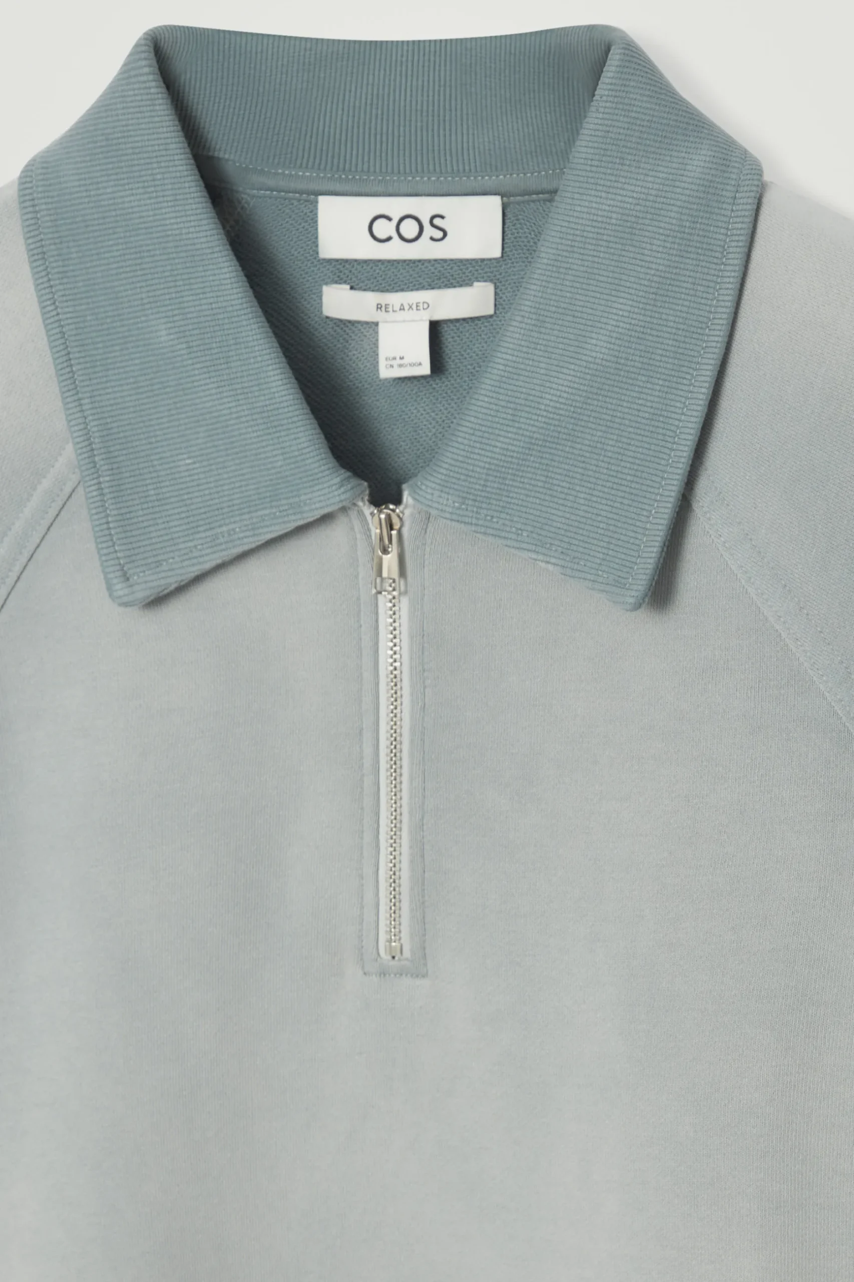 New COS KOSZULKA POLO Z ZAMKIEM I EFEKTEM SPRANIA Niebieski